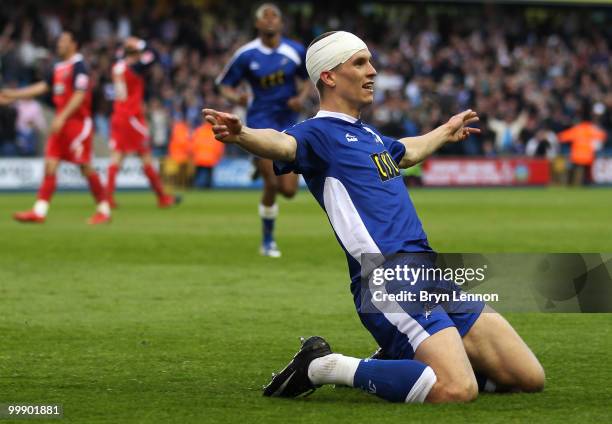 Steve Morison of Millwall celebrates scoring during the League One Playoff Semi Final 2nd Leg between Millwall and Huddersfield Town at The New Den...