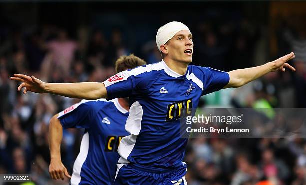 Steve Morison of Millwall celebrates scoring during the League One Playoff Semi Final 2nd Leg between Millwall and Huddersfield Town at The New Den...