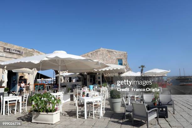 View of Marzamemi central square, a place where the Tv series based on Inspector Montalbano was filmed on June 05, 2018 in Marzamemi, Syracuse,...