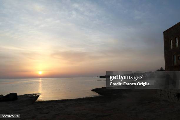View taken at the sunset of Montalbano's house and his beach, in the fictional 'Marinella', on June 04, 2018 in Punta Secca, Ragusa, Italy. Inspector...