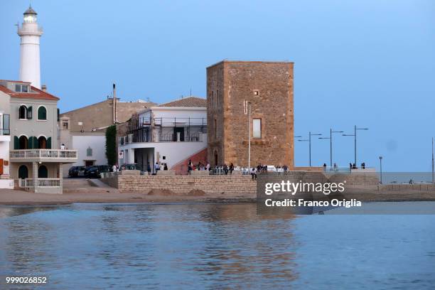View of Montalbano's house and the 16th century Scalambri Tower , on June 04, 2018 in Punta Secca, Ragusa, Italy. Inspector Salvo Montalbano is a...