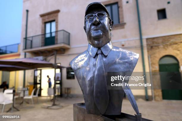 Sculpture featuring Sicilian writer Andrea Camilleri is seen in front Montalbano's house on June 04, 2018 in Punta Secca, Ragusa, Italy. Inspector...