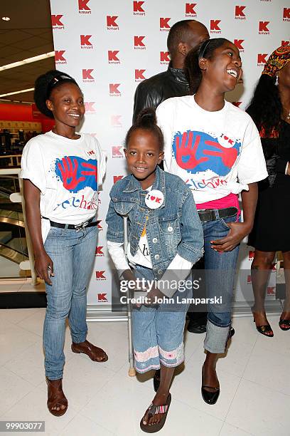 Claudinette Jean, Chantal Mori, Farah Maurice, Wyclef Jean and Margarette Pierre attend a charity shopping spree at Kmart on May 18, 2010 in New York...