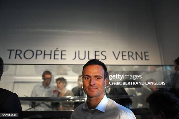 French skipper Franck Cammas poses after receiving the Jules Verne Trophy with his teammates, on May 18, 2010 during the award ceremony held at the...