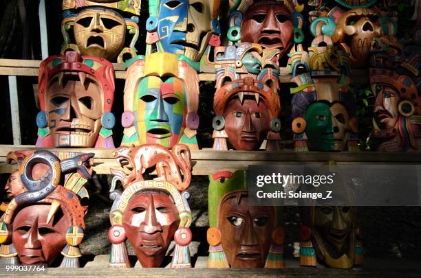 mayan masks in mexico at a stand - dark panthera stock pictures, royalty-free photos & images