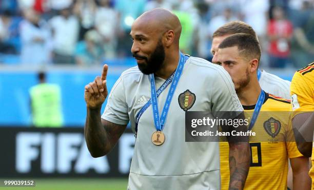 Assistant coach of Belgium Thierry Henry celebrates the victory after receiving the medal following the 2018 FIFA World Cup Russia 3rd Place Playoff...