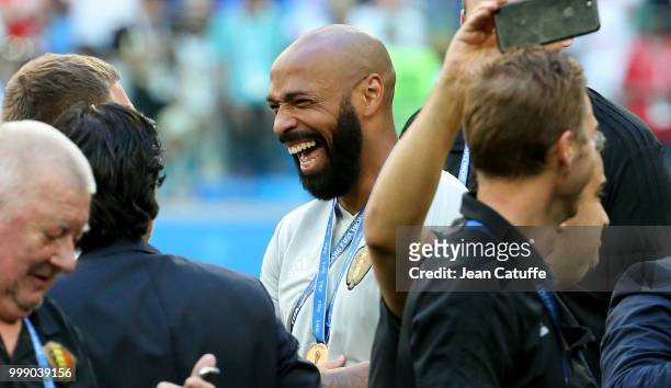 Assistant coach of Belgium Thierry Henry celebrates the victory after receiving the medal following the 2018 FIFA World Cup Russia 3rd Place Playoff...