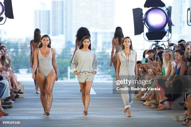 Models walk the runway for Acacia Resort 2019 during Paraiso Fashion Fair at 1111 Lincoln Road on July 14, 2018 in Miami, Florida.