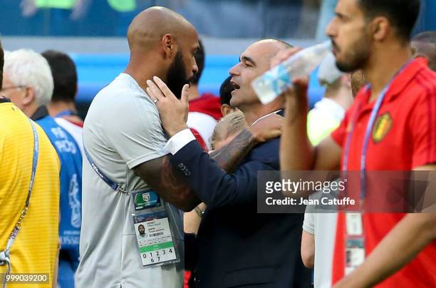Assistant coach of Belgium Thierry Henry greets head coach Roberto Martinez following the 2018 FIFA World Cup Russia 3rd Place Playoff match between...