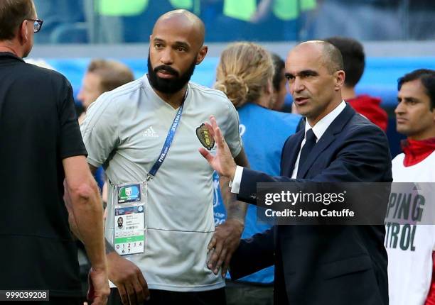 Assistant coach of Belgium Thierry Henry and head coach Roberto Martinez following the 2018 FIFA World Cup Russia 3rd Place Playoff match between...