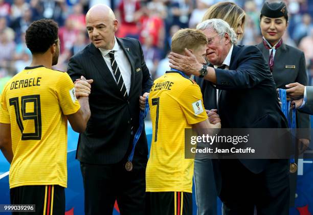 President Gianni Infantino and President of Royal Belgian Football Association Gerard Linard give medals to Mousa Dembele, Kevin De Bruyne of Belgium...