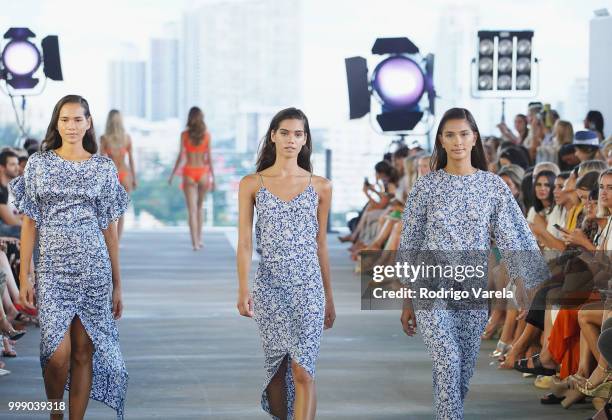 Models walk the runway for Acacia Resort 2019 during Paraiso Fashion Fair at 1111 Lincoln Road on July 14, 2018 in Miami, Florida.