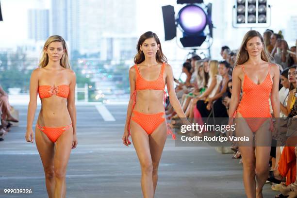 Models walk the runway for Acacia Resort 2019 during Paraiso Fashion Fair at 1111 Lincoln Road on July 14, 2018 in Miami, Florida.