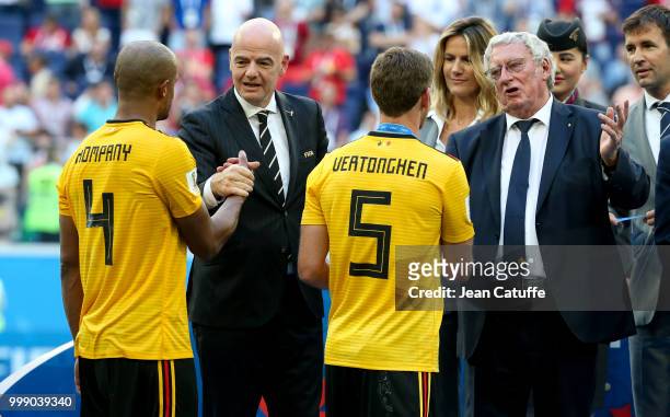 President Gianni Infantino and President of Royal Belgian Football Association Gerard Linard give medals to Vincent Kompany, Jan Vertonghen of...