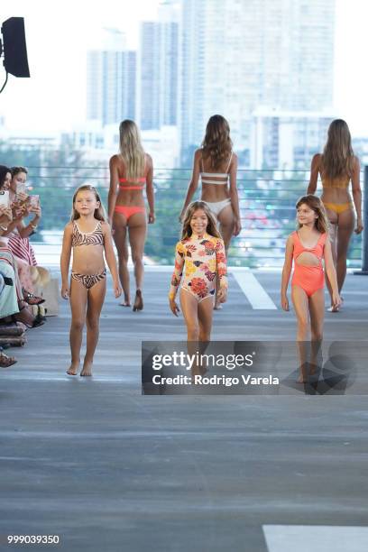 Models walk the runway for Acacia Resort 2019 during Paraiso Fashion Fair at 1111 Lincoln Road on July 14, 2018 in Miami, Florida.