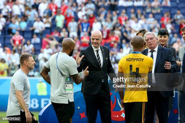 President Gianni Infantino and President of Royal Belgian Football Association Gerard Linard give medals to assistant coaches of Belgium Graeme Jones...