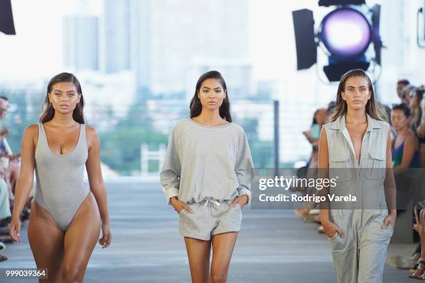 Models walk the runway for Acacia Resort 2019 during Paraiso Fashion Fair at 1111 Lincoln Road on July 14, 2018 in Miami, Florida.