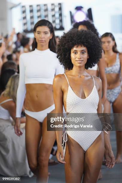 Models walk the runway for Acacia Resort 2019 during Paraiso Fashion Fair at 1111 Lincoln Road on July 14, 2018 in Miami, Florida.