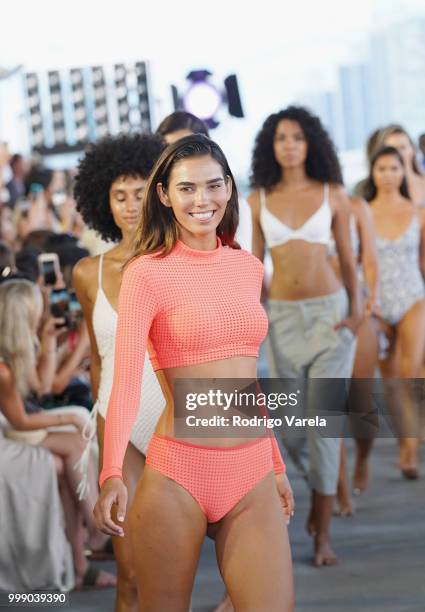 Models walk the runway for Acacia Resort 2019 during Paraiso Fashion Fair at 1111 Lincoln Road on July 14, 2018 in Miami, Florida.