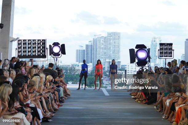 Models walk the runway for Acacia Resort 2019 during Paraiso Fashion Fair at 1111 Lincoln Road on July 14, 2018 in Miami, Florida.