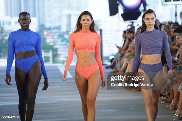 Models walk the runway for Acacia Resort 2019 during Paraiso Fashion Fair at 1111 Lincoln Road on July 14, 2018 in Miami, Florida.