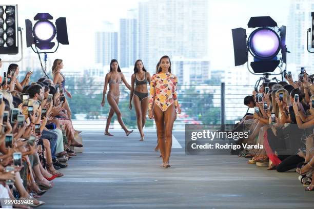 Models walk the runway for Acacia Resort 2019 during Paraiso Fashion Fair at 1111 Lincoln Road on July 14, 2018 in Miami, Florida.