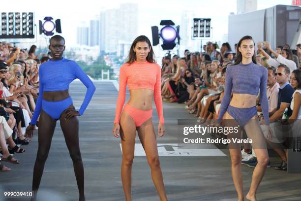 Models walk the runway for Acacia Resort 2019 during Paraiso Fashion Fair at 1111 Lincoln Road on July 14, 2018 in Miami, Florida.