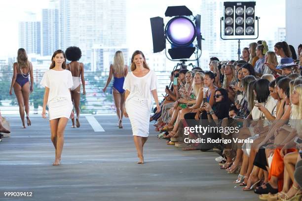 Models walk the runway for Acacia Resort 2019 during Paraiso Fashion Fair at 1111 Lincoln Road on July 14, 2018 in Miami, Florida.