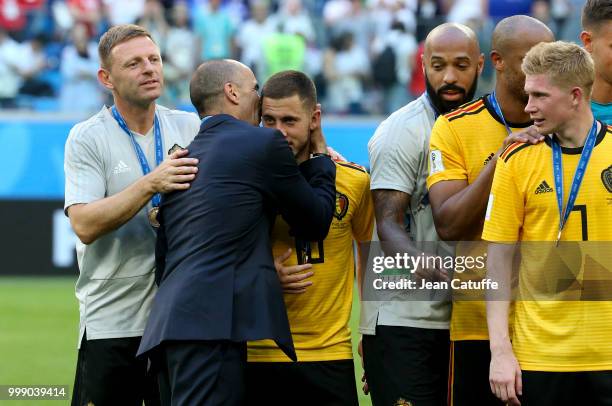 Assistant coach Graeme Jones, coach of Belgium Roberto Martinez greeting Eden Hazard, assistant coach Thierry Henry, Kevin De Bruyne during the medal...