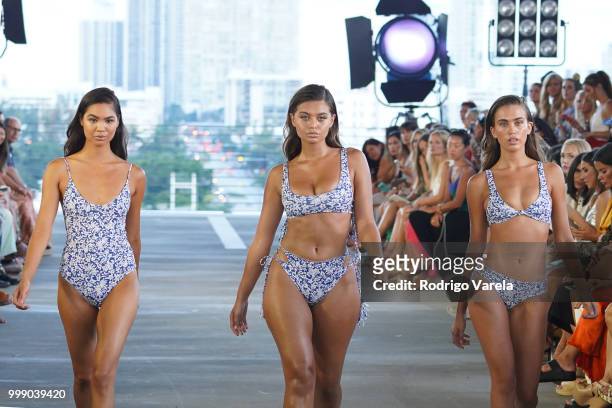 Models walk the runway for Acacia Resort 2019 during Paraiso Fashion Fair at 1111 Lincoln Road on July 14, 2018 in Miami, Florida.