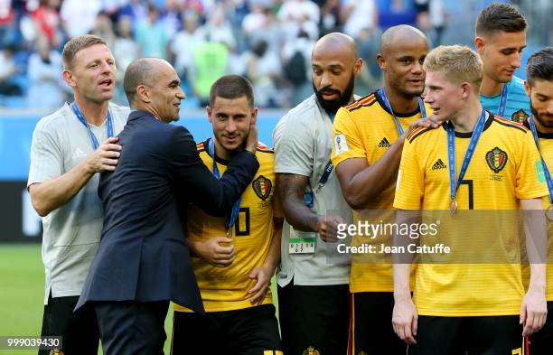 Assistant coach Graeme Jones, coach of Belgium Roberto Martinez greeting Eden Hazard, assistant coach Thierry Henry, Vincent Kompany, Kevin De Bruyne...