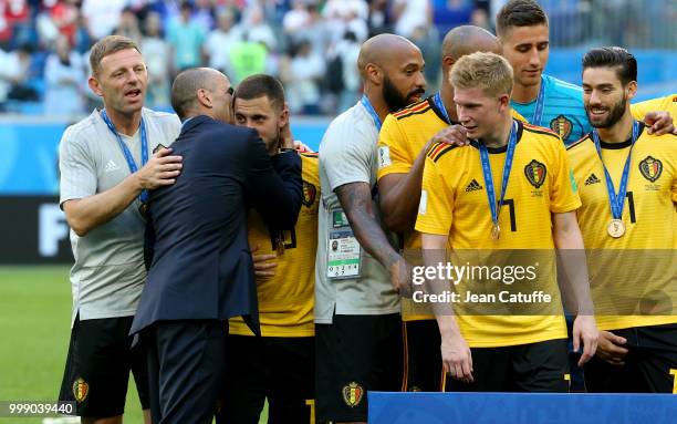 Assistant coach Graeme Jones, coach of Belgium Roberto Martinez greeting Eden Hazard, assistant coach Thierry Henry, Kevin De Bruyne, Yannick...