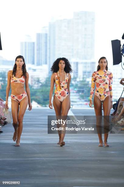 Models walk the runway for Acacia Resort 2019 during Paraiso Fashion Fair at 1111 Lincoln Road on July 14, 2018 in Miami, Florida.