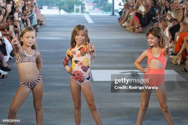 Models walk the runway for Acacia Resort 2019 during Paraiso Fashion Fair at 1111 Lincoln Road on July 14, 2018 in Miami, Florida.