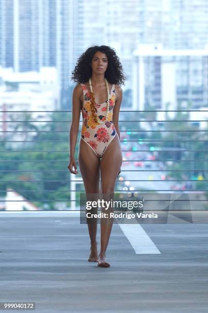 Model walks the runway for Acacia Resort 2019 during Paraiso Fashion Fair at 1111 Lincoln Road on July 14, 2018 in Miami, Florida.