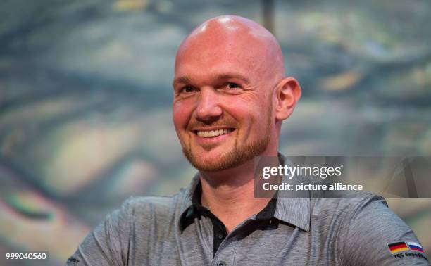 Atronaut Alexander Gerst speaks during the opening of an exhibition about the Mars in Kuenzelsau, Germany, 11 August 2017. Gerst shall set out for a...