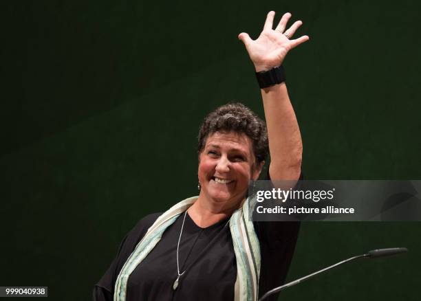 The top candidate, fraction chairwoman of the German party Buendnis 90 / Die Gruenen , Anja Piel, waves during the conference of state delegates of...