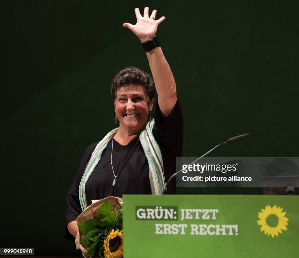 The top candidate, fraction chairwoman of the German party Buendnis 90 / Die Gruenen , Anja Piel, waves during the conference of state delegates of...