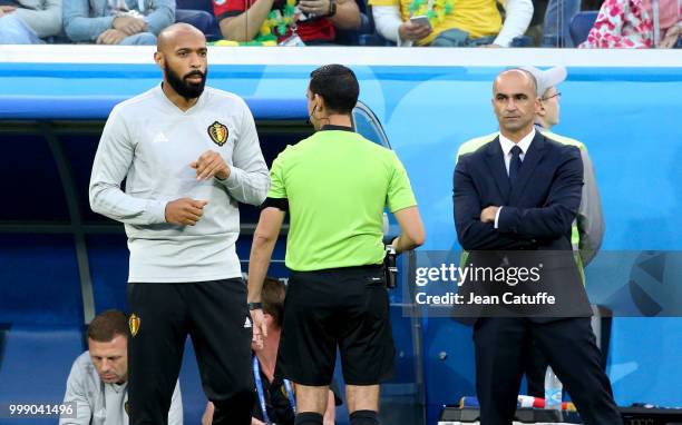 Assistant coach of Belgium Thierry Henry, coach of Belgium Roberto Martinez during the 2018 FIFA World Cup Russia Semi Final match between France and...