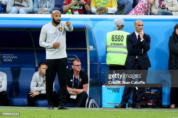Assistant coach of Belgium Thierry Henry, coach of Belgium Roberto Martinez during the 2018 FIFA World Cup Russia Semi Final match between France and...