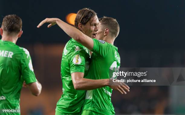 Gladbach's Matthias Ginter and Jannik Vestergaard celebrate at the end of the German Soccer Association Cup first round soccer match between Rot...