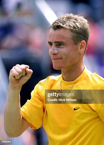 Lleyton Hewitt of Australia celebrates his 7/6, 5/7,6/2,6/1 win over Thomas Johansson of Sweden to win the tie for Australia during the third day's...