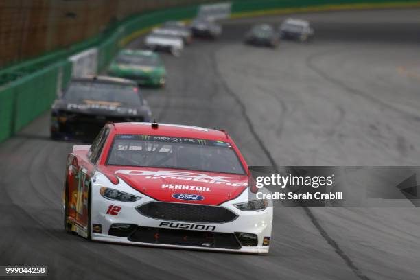 Ryan Blaney, driver of the DEX Imaging Ford, leads a pack of cars during the Monster Energy NASCAR Cup Series Quaker State 400 presented by Walmart...