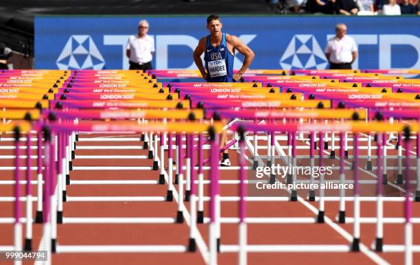 American athlete Trey Hardee after stumbling during the men's 110 metre hurdle race event at the IAAF World Championships in London, UK, 12 August...