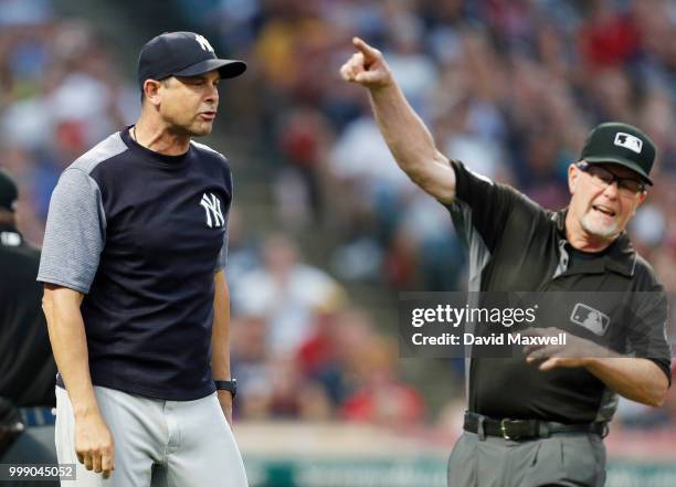 Manager Aaron Boone of the New York Yankees is ejected from the game by First Base Umpire Jerry Meals while arguing that Giancarlo Stanton was hit by...