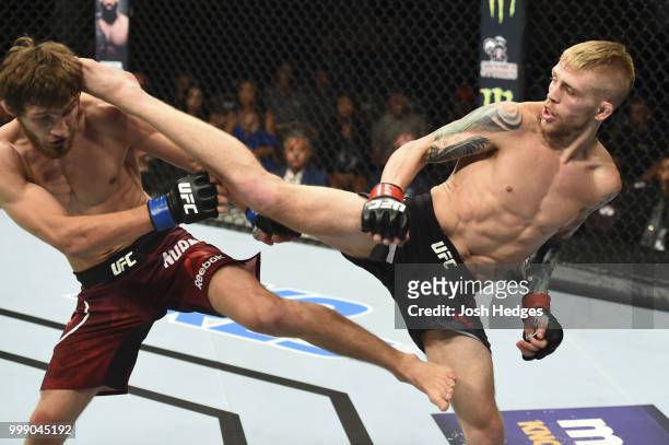Justin Scoggins kicks Said Nurmagomedov of Russia in their flyweight fight during the UFC Fight Night event inside CenturyLink Arena on July 14, 2018...