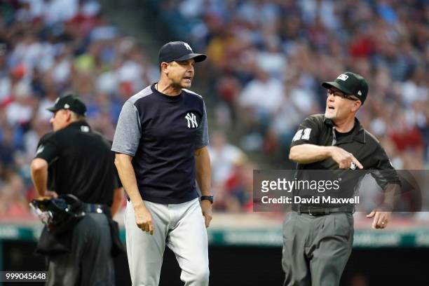 Manager Aaron Boone of the New York Yankees is ejected from the game by First Base Umpire Jerry Meals while arguing that Giancarlo Stanton was hit by...
