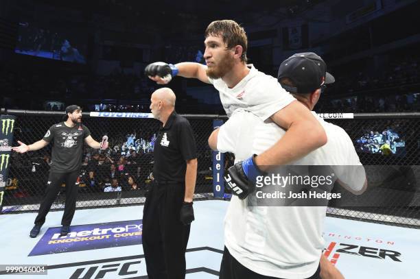 Said Nurmagomedov of Russia celebrates after defeating Justin Scoggins by split decision in their flyweight fight during the UFC Fight Night event...