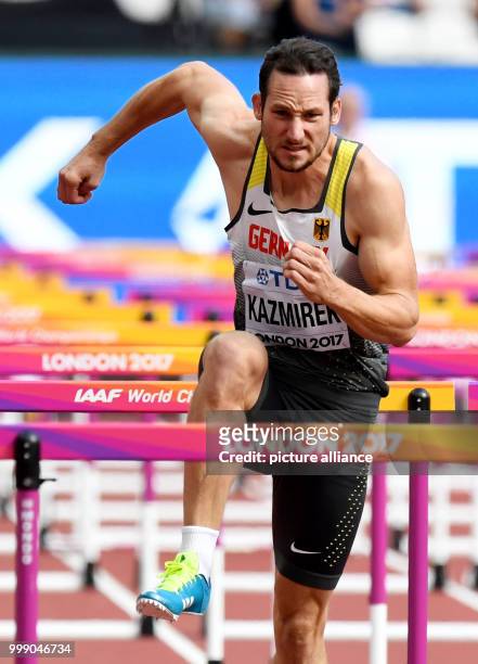 German athlete Kai Kazmirek competes in the men's 110 metre hurdle race decathlon event at the IAAF World Championships in London, UK, 12 August...
