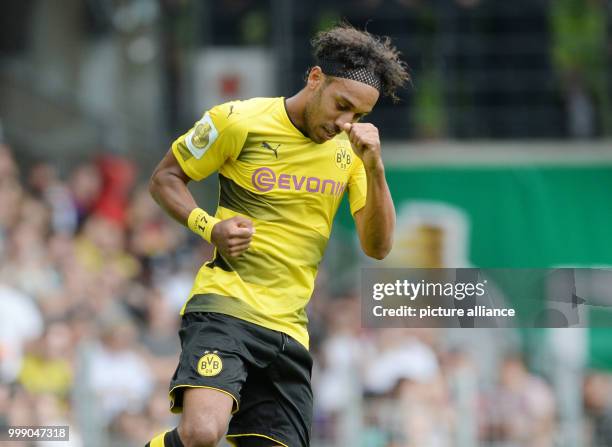 Dortmund's Pierre Aubameyang celebrates after giving his side a 2:0 lead during the German Soccer Association Cup first-round soccer match between 1....